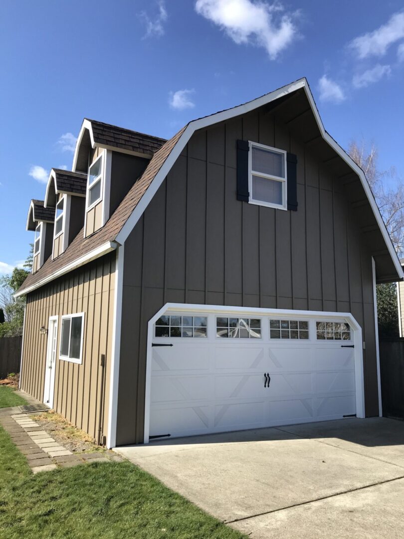 White residential garage door installed on Idaho home