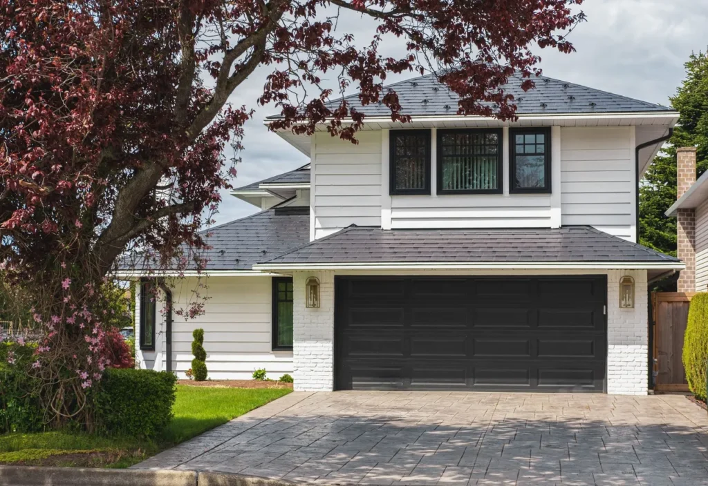 New residential garage door installation improving home exterior