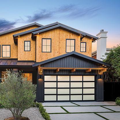 Finished garage door installation by Quality Overhead Door Inc