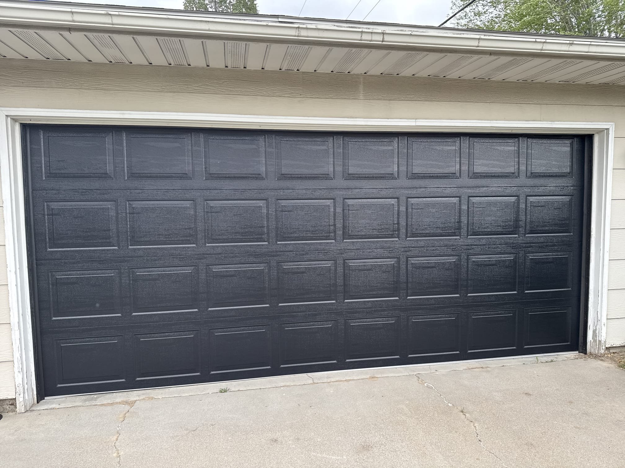 Custom home garage door installation completed by Quality Overhead Door