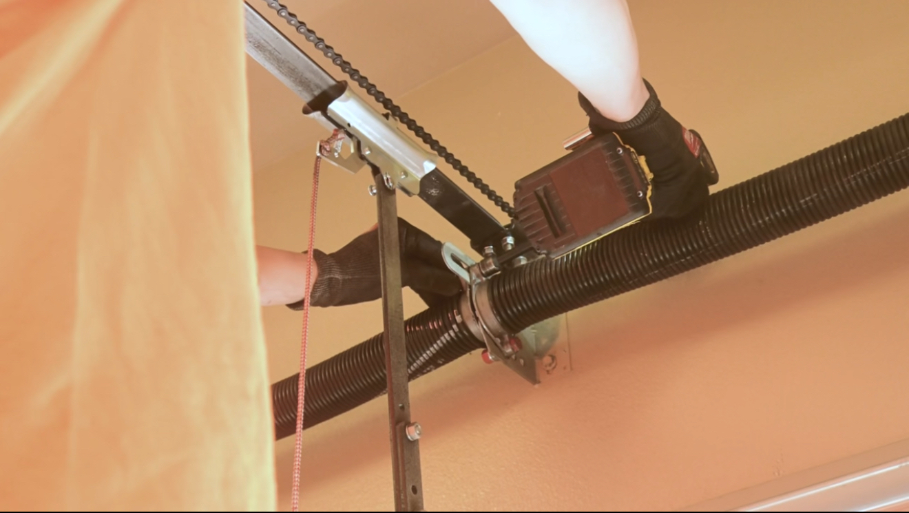 Garage door balance inspection by Quality Overhead Door