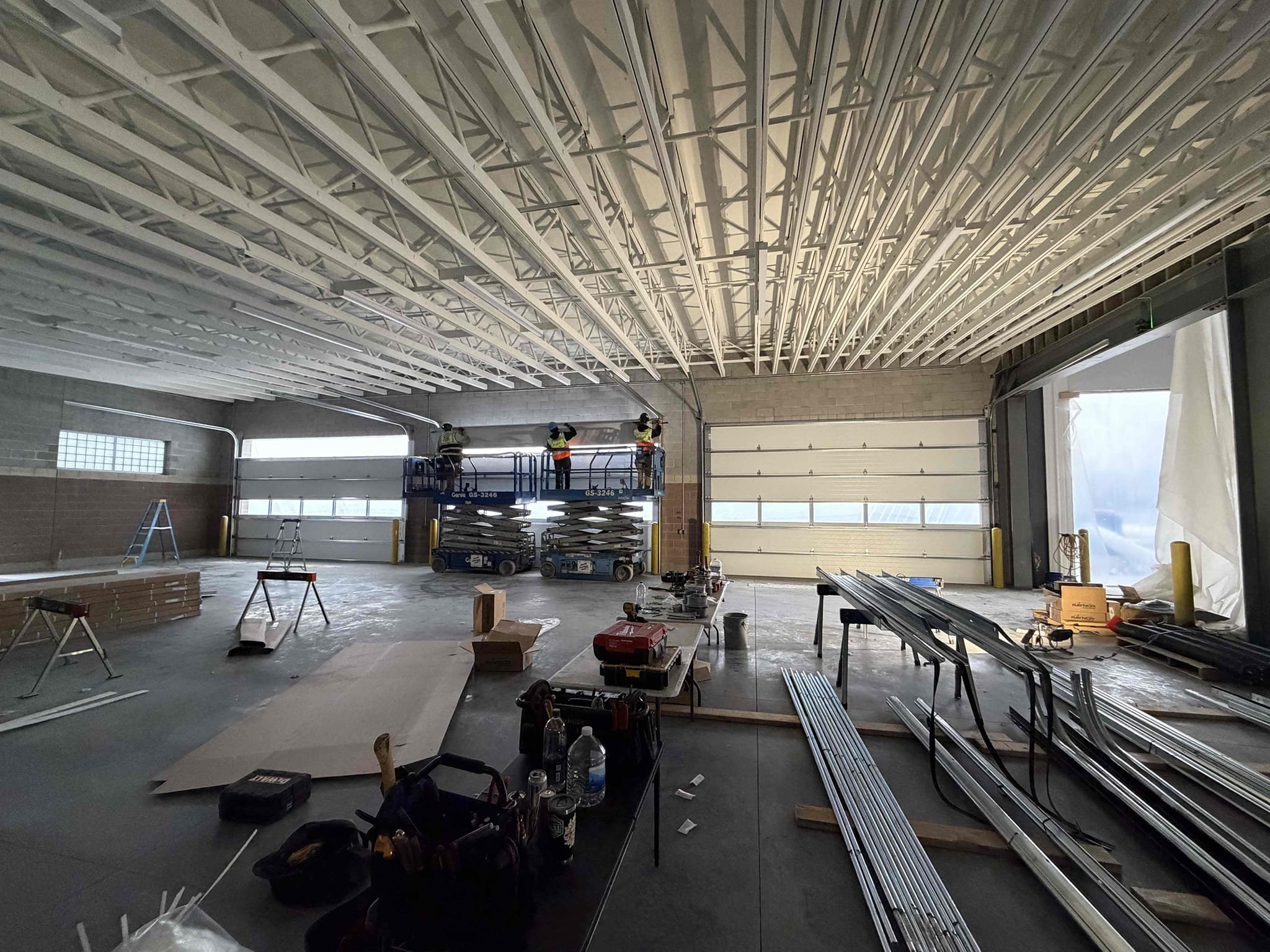 Garage door installation team completing a project in Southeast Idaho